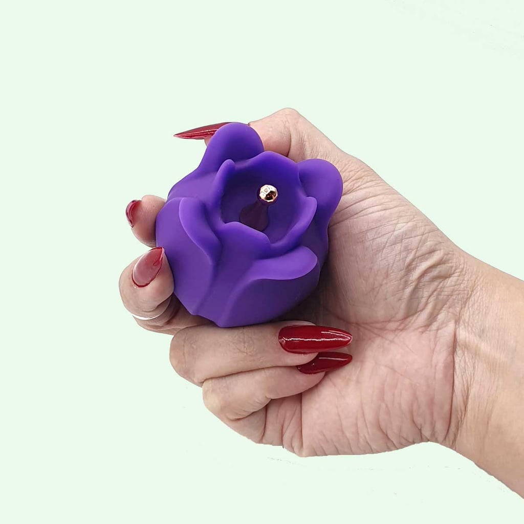 Estimulador de Clitóris Recarregável no Formato de Rosa com 10 Modos de Vibrações - Man Ting Hua | Disponível em 2 Cores - 12