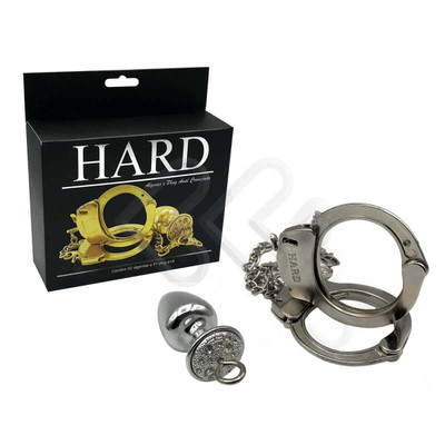 Foto 1 do produto Par de Algemas em Metal com Chave de Segurança e Plug Anal "M" com Detalhes de Pedras Cravejadas - HARD - 7,2 x 3,4 cm | Cor: Cromado