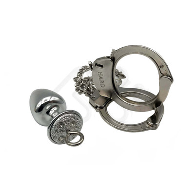 Foto 3 do produto Par de Algemas em Metal com Chave de Segurança e Plug Anal "M" com Detalhes de Pedras Cravejadas - HARD - 7,2 x 3,4 cm | Cor: Cromado