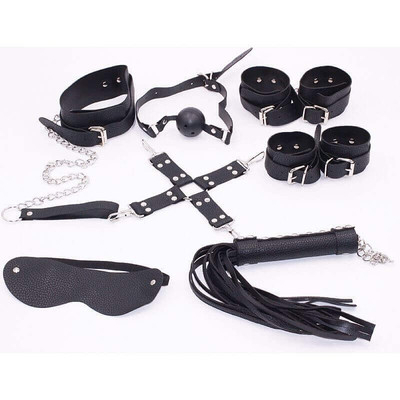 Foto 1 do produto Kit Bondage - Kit com Algema, Tornozeleira, Coleira, Venda, Guia, Chicote e Mordaça - Contém 7 Itens | Cor: Preto