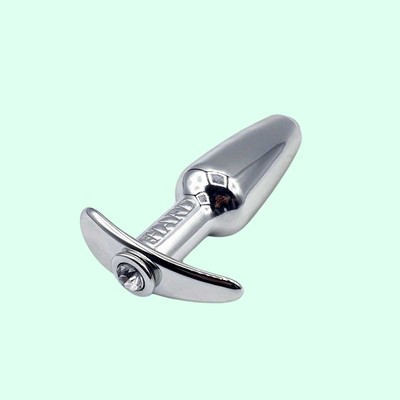 Foto 7 do produto Plug Anal com Compartimento para Lubrificante e Pedra Brilhante na Base - Hard Splash | 9,5 x 3 cm | Disponível em 7 Cores