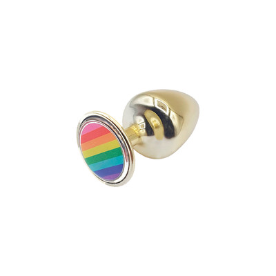 Foto 2 do produto Plug Anal Cônico "M" Com Detalhe de Pedra com Bandeira do Orgulho - Hard Pride | 6,5 x 3,4 cm | Cor: Dourado