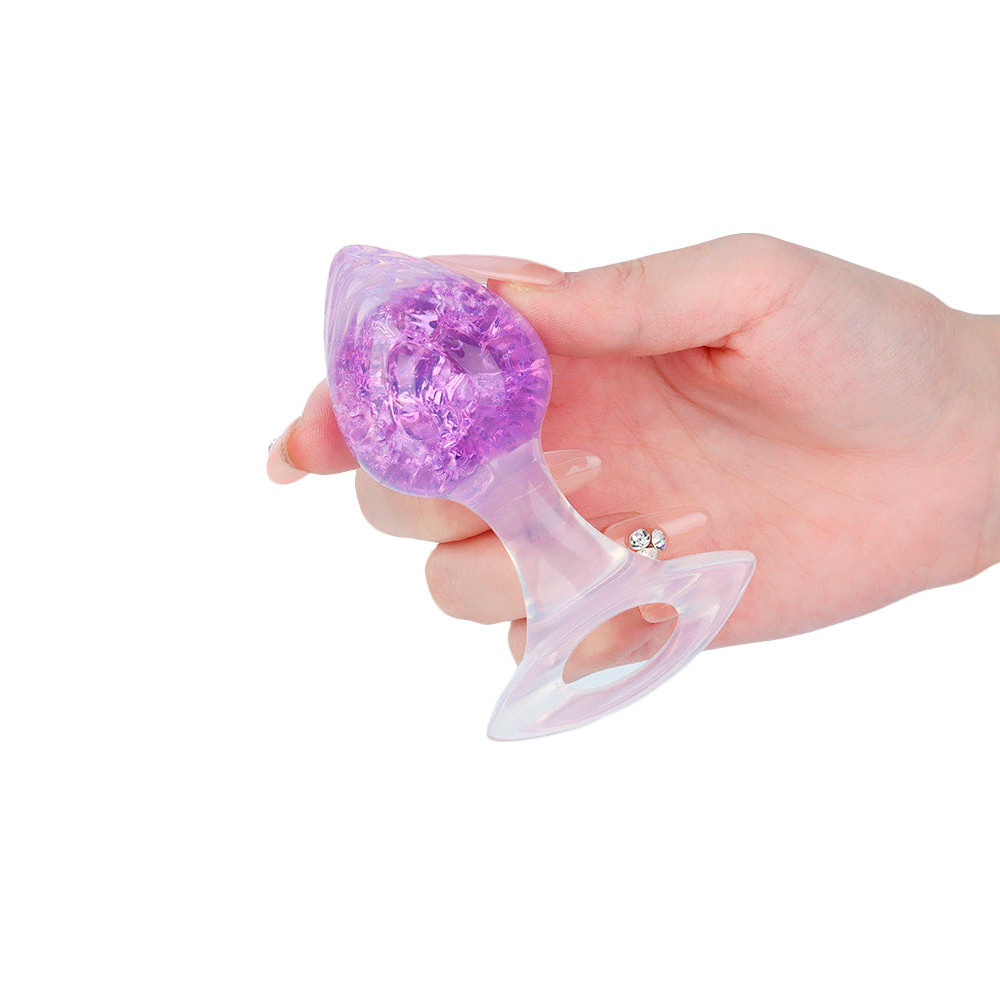 Plug Anal ''M'' de Silicone Platina Com Esfera de Vidro Interna, Alça e Detalhe de Coração - YouVibe | 7,4 x 3,8 cm | Disponível em 6 Cores - 12