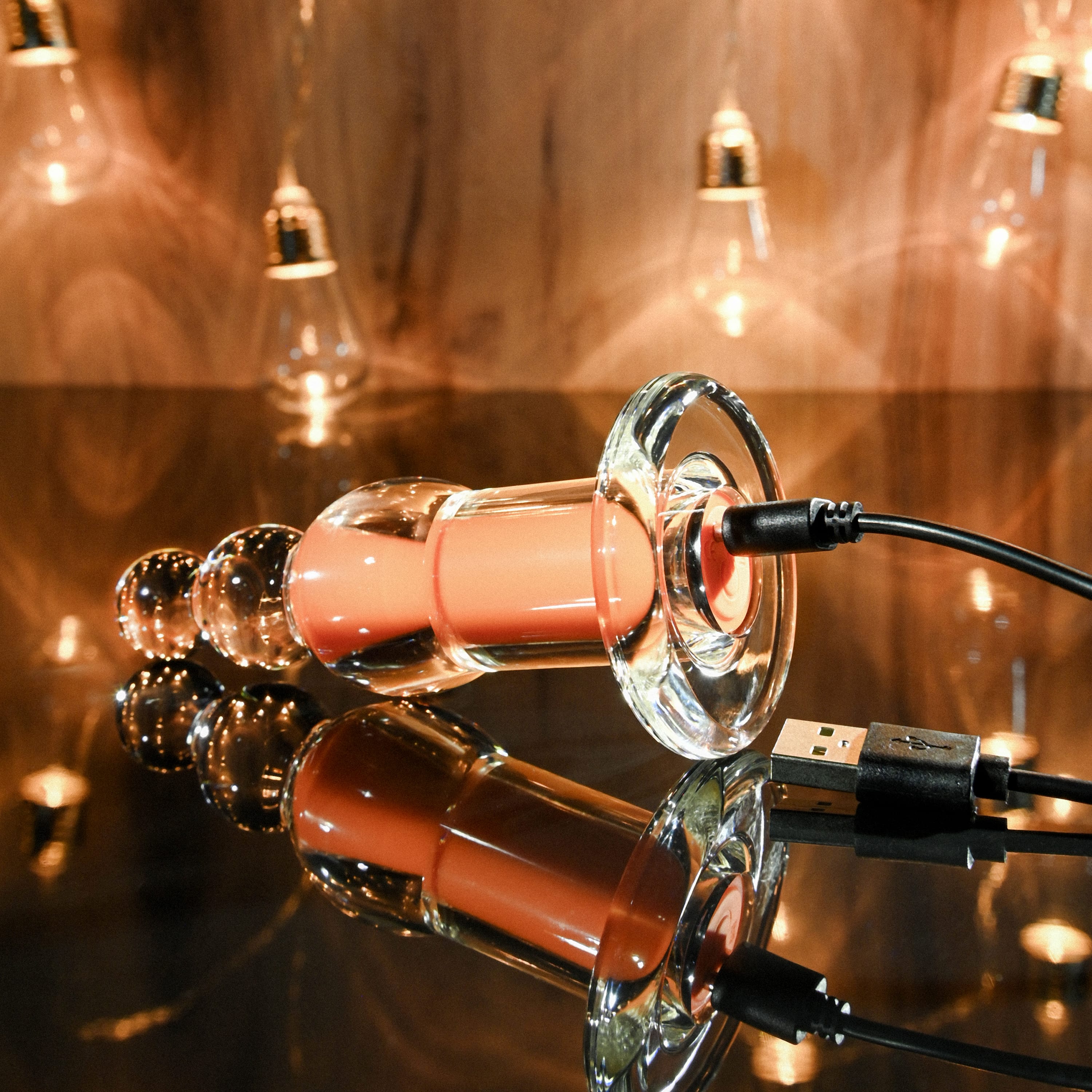 Plug Anal Recarregável Transparente com Cápsula Interna, 10 Modos de Vibração e Controle Remoto - Gender X Orange Dream | 10 x 3,5 cm - 3