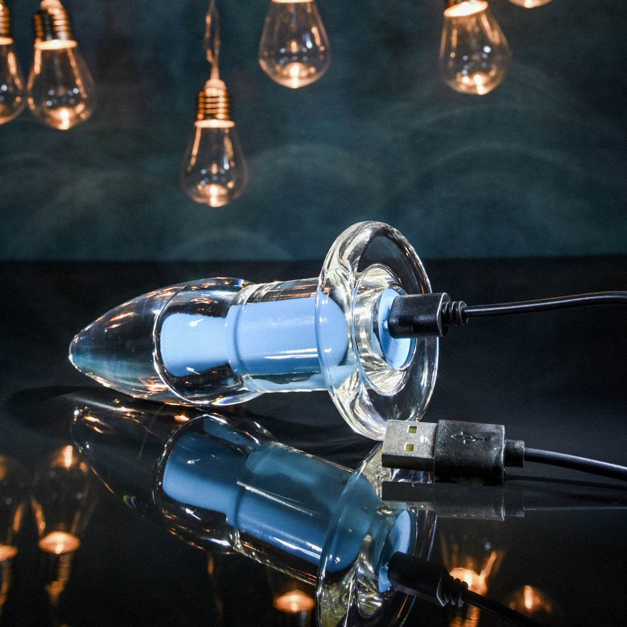 Plug Anal Recarregável Transparente com 10 Modos de Vibração e Controle Remoto - Gender X Eletric Blue | 10,5 x 3,7 cm - 3