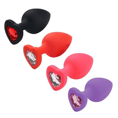 Plug Anal em Silicone no Tamanho "M" com Pedra Brilhante na Base no Formato de Coração - SI | 6,5 x 3,4 cm | Disponível em 4 Cores