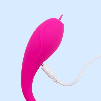 Foto 4 do produto Vibrador Estimulador de Clitóris em Silicone com Língua Massageadora, 10 Modos de Vibração, Controle Remoto Sem Fio e Recarregável - Jumping Egg | 19 x 3,3 cm